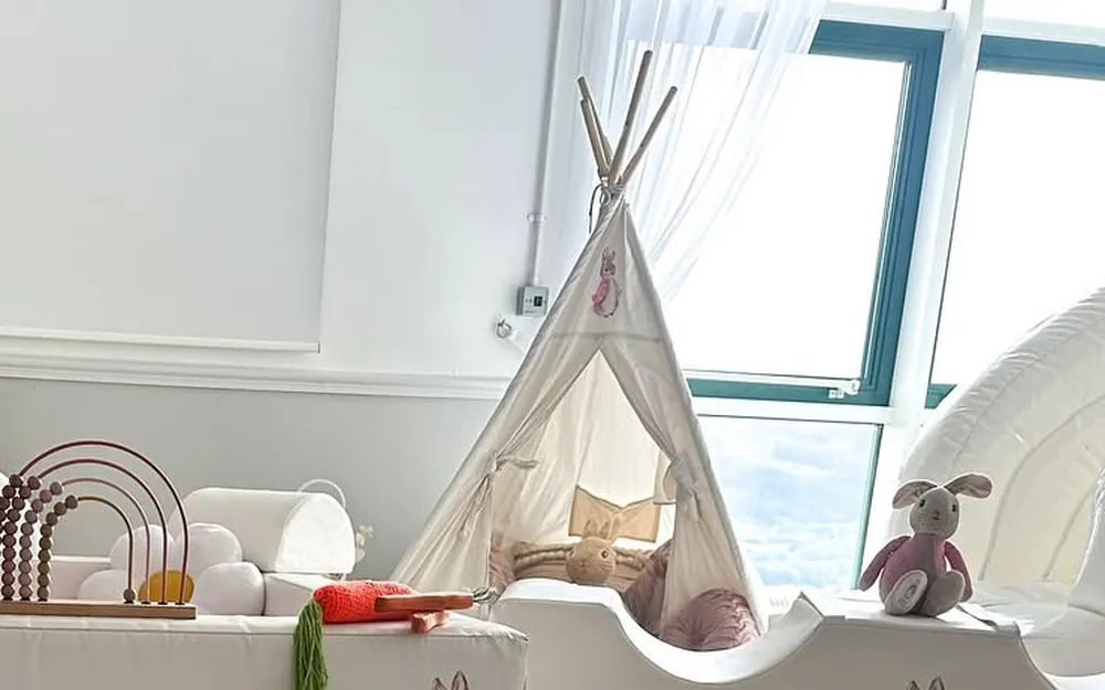 A children's party set up in the function room with soft play, a teepee and a ball pit